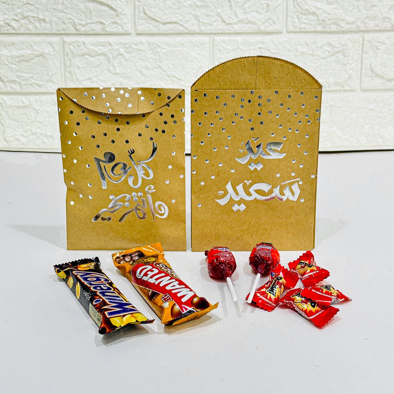 photo_1_2024-03-26_00-46-24 ظرف عيدية بيج كتابة فضية للأطفال عبوة 12 ظرف توزيعة - الصورة 1