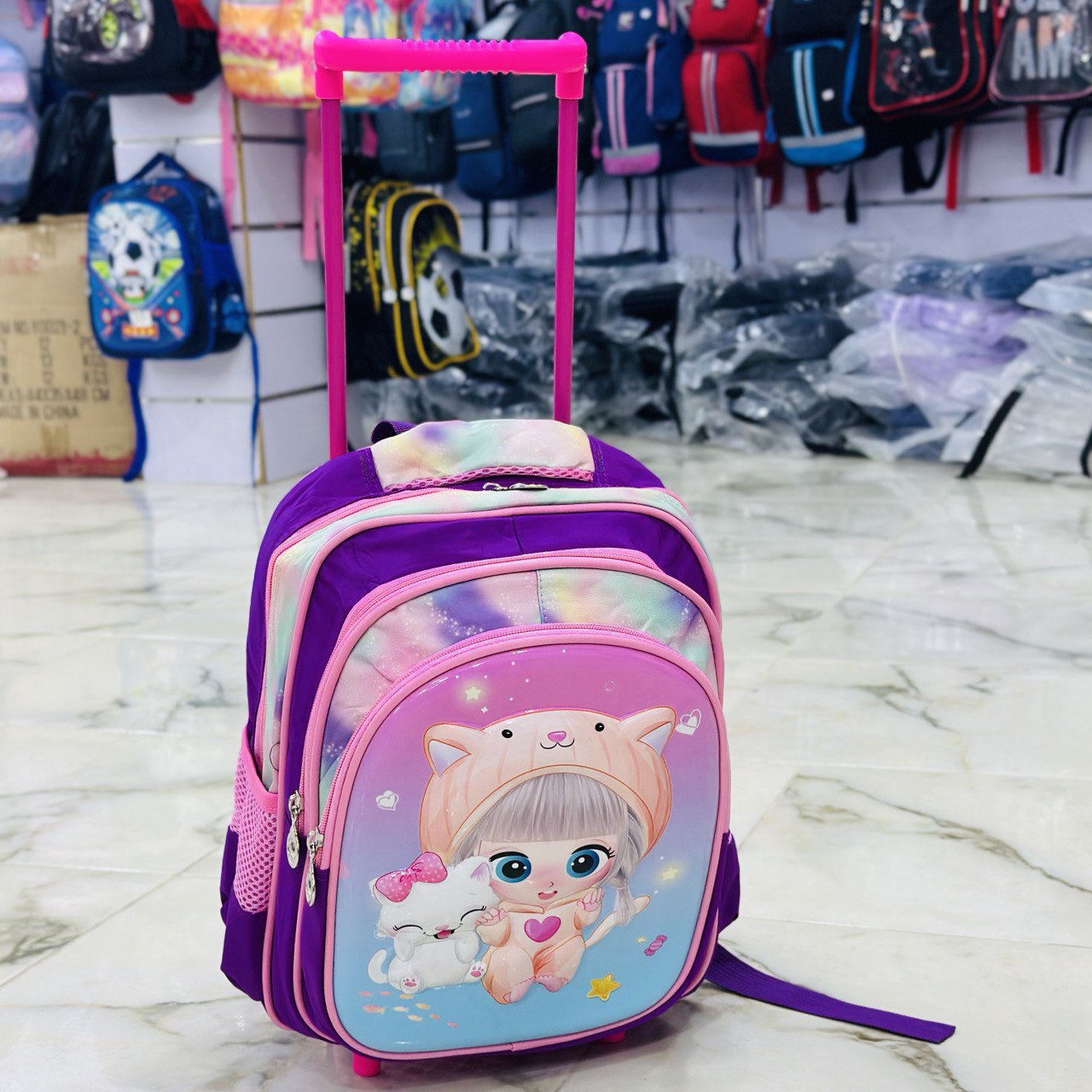 photo_2_2024-08-31_00-10-27 حقيبة عجلات روضة بنوتة كيوت 3 جيوب جر - الصورة 1