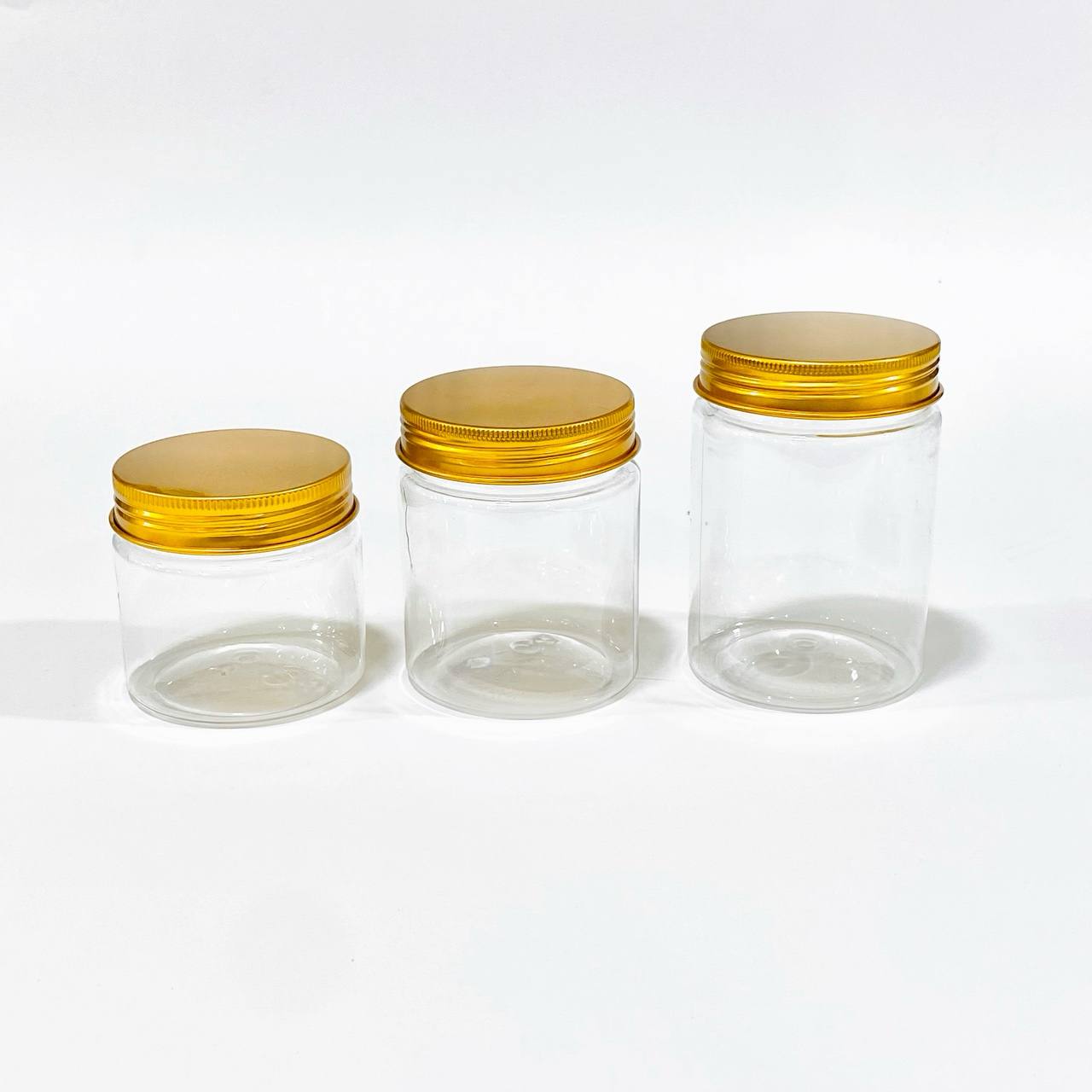 photo_5_2024-11-08_15-39-12 علب شفافة بغطاء ذهبي محكم لتخزين المنتجات والتوزيعات للمناسبات - الصورة 1