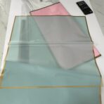 ⁦غلاف باقات ورد و شكلاطة وهدايا اطار ذهبي نايلو مقاس 56*58⁩ - الصورة ⁦2⁩