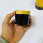 ⁦علب بلاستيك لون اسود غطاء ملون خشبي متعددة الاستعمالات عبوة 100/150 مل⁩ - الصورة ⁦7⁩