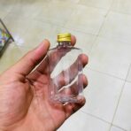 ⁦دستة علب بلاستيك مستطيلة شفافة 100 مل 12 شيشة غطاء ذهبي متعددة الاستعمالات⁩ - الصورة ⁦3⁩