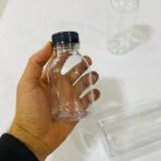 ⁦علب فارغة بلاستيك غطاء اسود شيشة متعددة الاستعمالات عبوة - ربع / نصف / لتر للمناسبات والافراح⁩ - الصورة ⁦5⁩