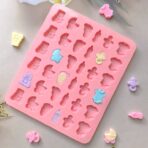 ⁦قالب سيليكون 36 تجويف تصميم حاجات البيبي دبدوب رضاعه لهاية عفسة بيبي عربة ولبسة MA93⁩ - الصورة ⁦5⁩