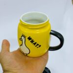 ⁦مق سيراميك مع غطاء هدية رسمة بطوط⁩ - الصورة ⁦5⁩