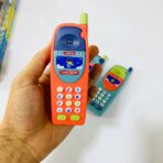 ⁦لعبة هاتف أطفال مع موسيقى وإضاءة مع بطارية مجاناً ، اختيار لون عشوائي⁩ - الصورة ⁦2⁩