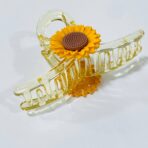 ⁦مساكة شعر ترند راقية وردة عباد الشمس لون عسلي / برتقالي & أسود⁩ - الصورة ⁦2⁩