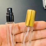 ⁦عبوة فاخرة زجاجية 10 مل تقسيم العطور ، باللون ذهبي والاسود⁩ - الصورة ⁦4⁩