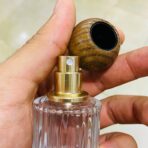 ⁦عبوة عطر زجاجية فارغة تصميم راقي 30 مل غطاء خشبي⁩ - الصورة ⁦3⁩